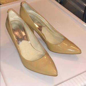 Taupe patent leather heels